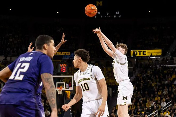 Justin Pippen (10) and Sam Walters (24)