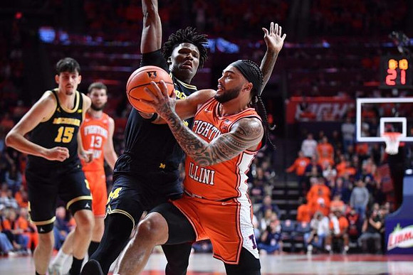 Aday Mara (15) and L.J. Cason (2)