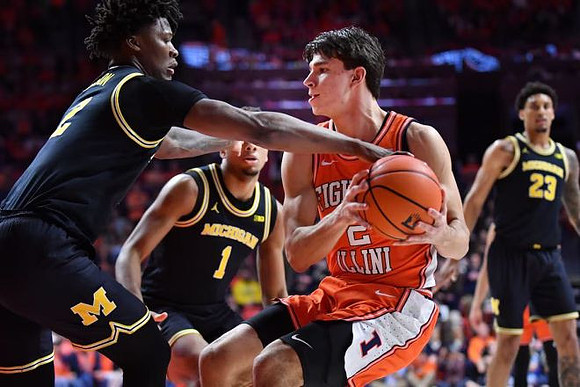 L.J. Cason (2), Trey McKenney (1), and Yaxel Lendeborg (23)