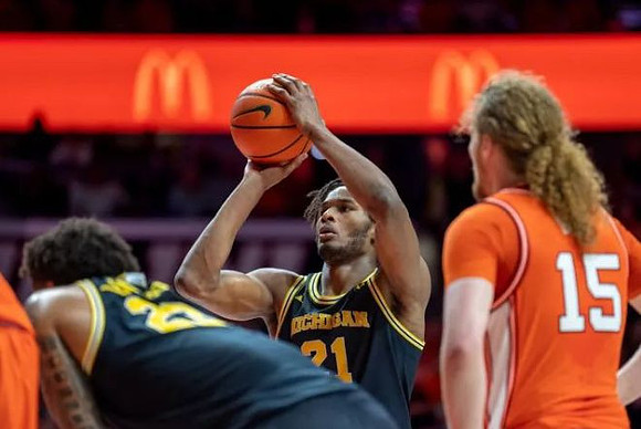 Yaxel Lendeborg (23) and Morez Johnson Jr. (21)
