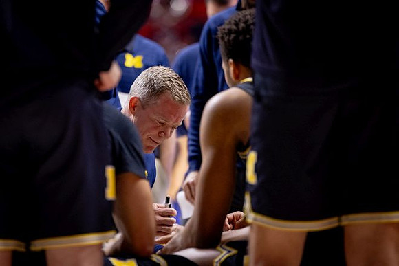 Dusty May and Michigan Team