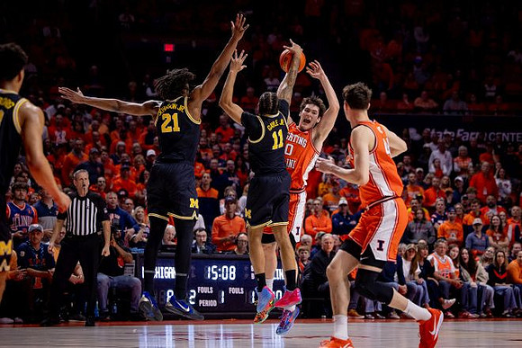 Yaxel Lendeborg (23), Morez Johnson Jr. (21), and Roddy Gayle Jr. (11)