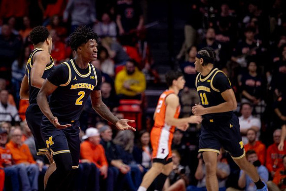 Yaxel Lendeborg (23), L.J. Cason (2), and Roddy Gayle Jr. (11)