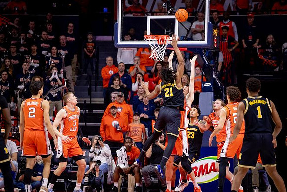 Morez Johnson Jr. (21), Yaxel Lendeborg (23), and Trey McKenney (1)