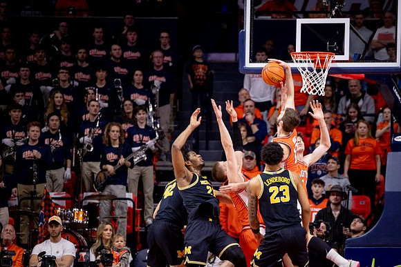 Will Tschetter (42), Morez Johnson Jr. (21), and Yaxel Lendeborg (23)
