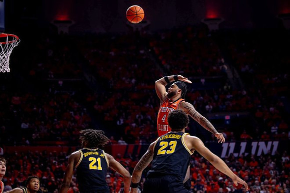 Trey McKenney (1), Morez Johnson Jr. (21), and Yaxel Lendeborg (23)