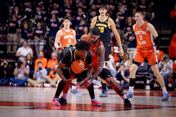L.J. Cason (2) and Aday Mara (15)