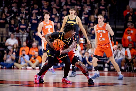 L.J. Cason (2) and Aday Mara (15)