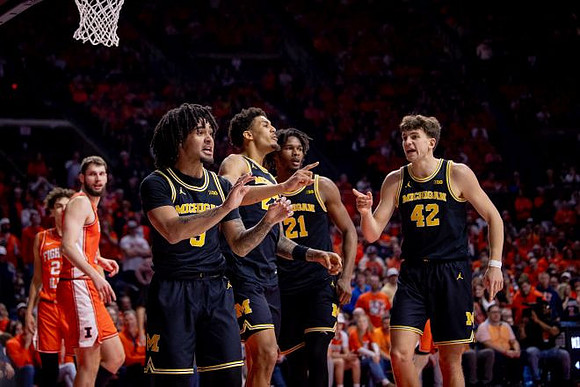 Elliot Cadeau (3), Yaxel Lendeborg (23), Morez Johnson Jr. (21), and Will Tschetter (42)