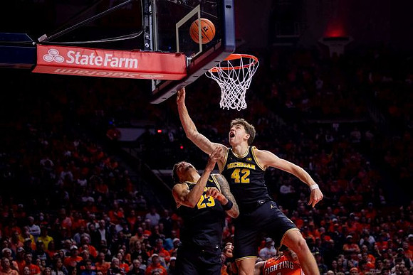 Yaxel Lendeborg (23) and Will Tschetter (42)