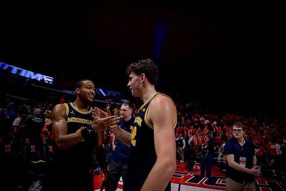 Nimari Burnett (4) and Will Tschetter (42)