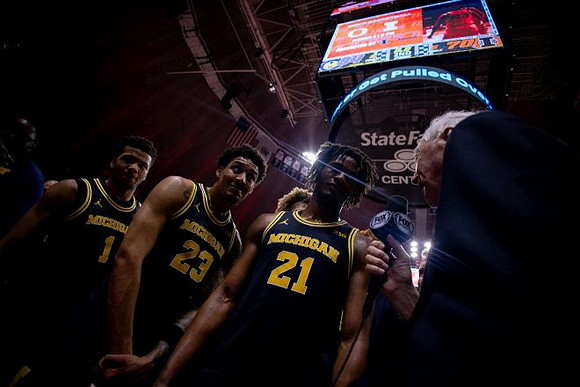 Trey McKenney (1), Yaxel Lendeborg (23), and Morez Johnson Jr. (21)