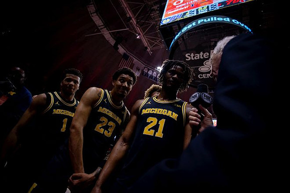 Trey McKenney (1), Yaxel Lendeborg (23), and Morez Johnson Jr. (21)