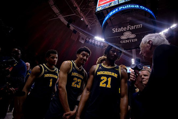 Trey McKenney (1), Yaxel Lendeborg (23), and Morez Johnson Jr. (21)