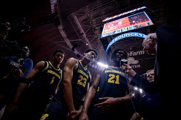 Trey McKenney (1), Yaxel Lendeborg (23), Morez Johnson Jr. (21), and Dusty May