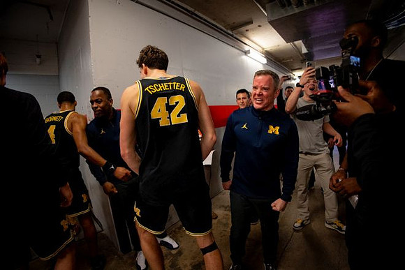 Nimari Burnett (4), Will Tschetter (42), and Dusty May