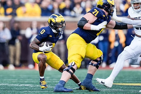 Semaj Morgan (0) and Evan Link (71)