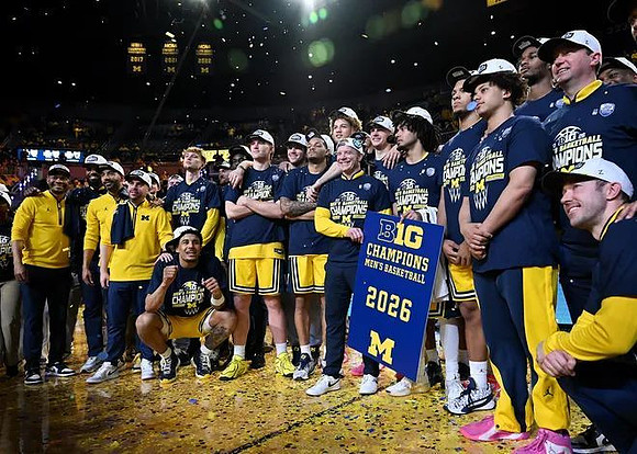 Dusty May and Michigan Team