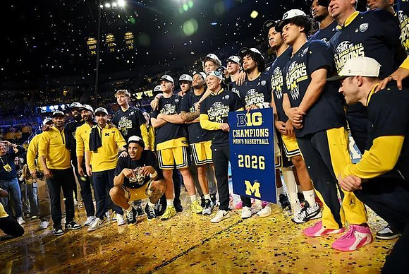 Dusty May and Michigan Team