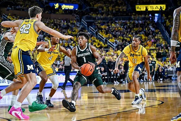 Will Tschetter (42), Nimari Burnett (4), and Roddy Gayle Jr. (11)