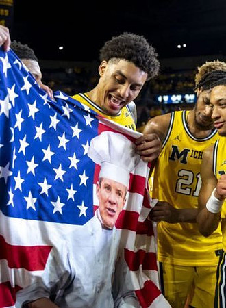 Yaxel Lendeborg (23), Morez Johnson Jr. (21), and Nimari Burnett (4)
