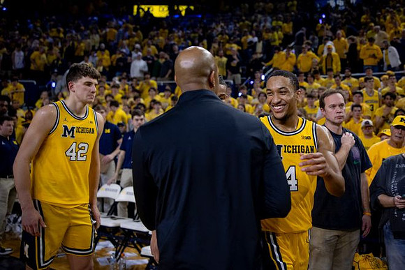 Will Tschetter (42) and Nimari Burnett (4)