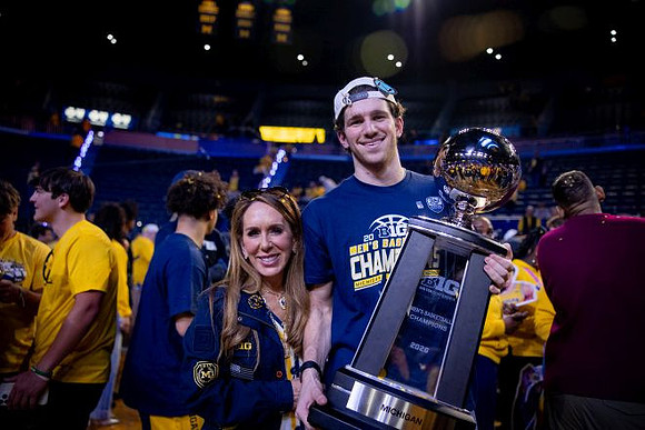 Michigan Player and Big Ten Championship Trophy