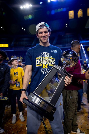 Michigan Player and Big Ten Championship Trophy