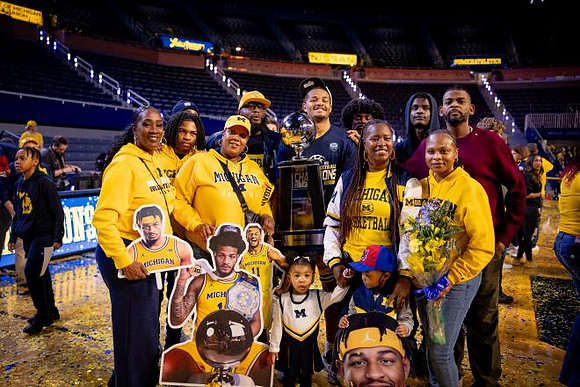 Roddy Gayle Jr. (11) and Big Ten Championship Trophy