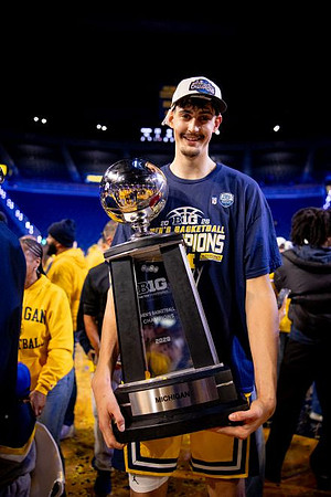 Aday Mara (15) and Big Ten Championship Trophy