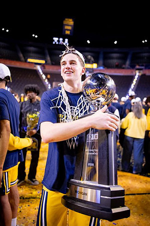 Will Tschetter (42) and Big Ten Championship Trophy