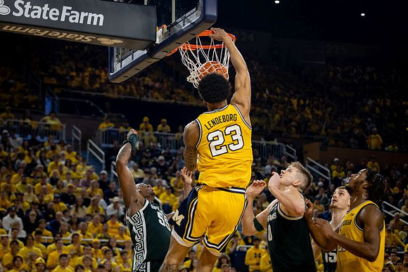 Yaxel Lendeborg (23) and Morez Johnson Jr. (21)