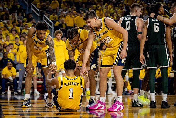 Yaxel Lendeborg (23), Trey McKenney (1), Roddy Gayle Jr. (11), and Will Tschetter (42)
