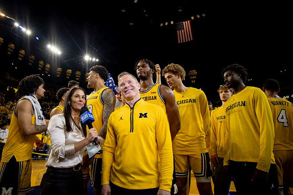 Dusty May and Michigan Team