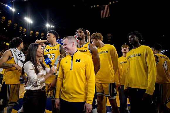 Dusty May and Michigan Team