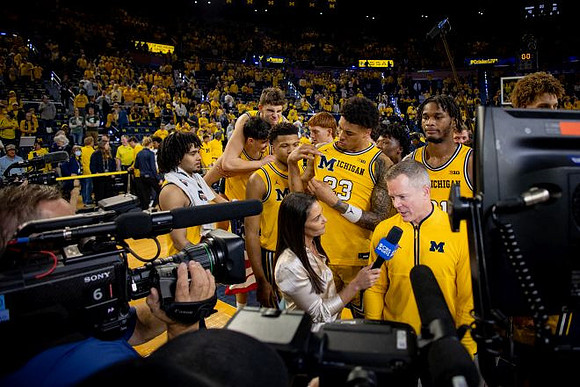 Dusty May and Michigan Team