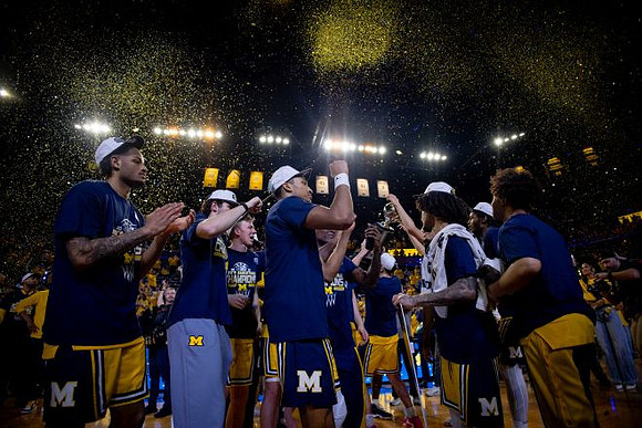 Michigan Team and Big Ten Championship Trophy