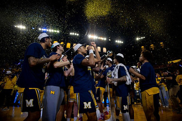 Michigan Team and Big Ten Championship Trophy
