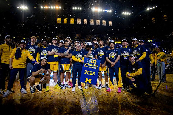 Dusty May and Michigan Team