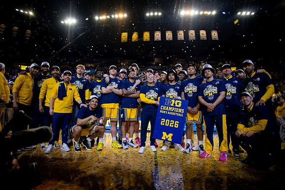Dusty May and Michigan Team
