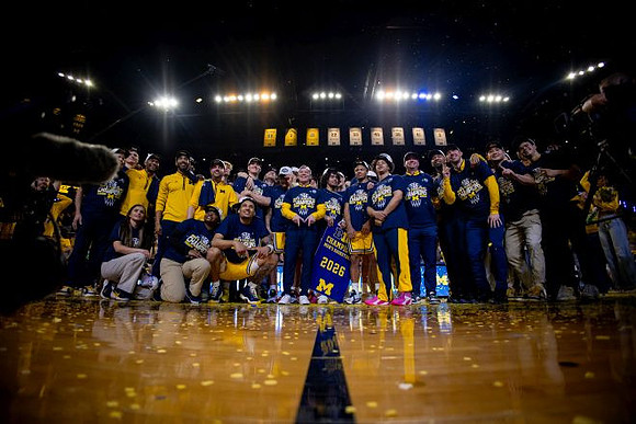 Dusty May and Michigan Team