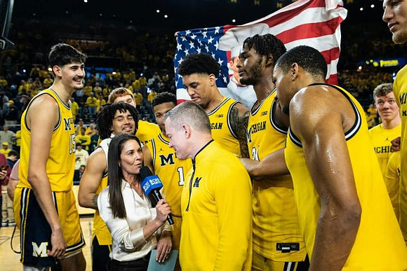 Dusty May and Michigan Team