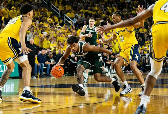 Yaxel Lendeborg (23), Roddy Gayle Jr. (11), and Nimari Burnett (4)