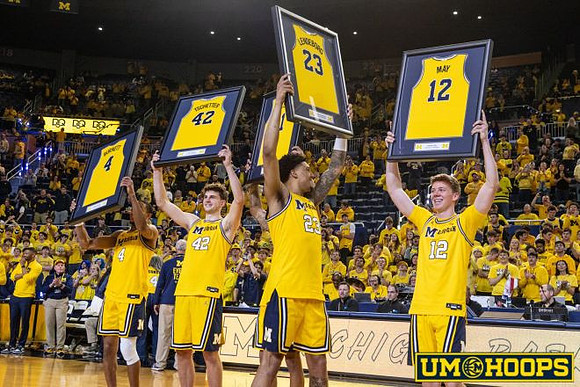 Nimari Burnett (4), Will Tschetter (42), Yaxel Lendeborg (23), and Charlie May (12)
