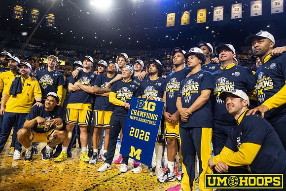 Dusty May and Michigan Team