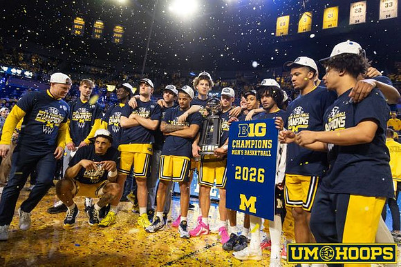 Dusty May, Big Ten Championship Trophy, and Michigan Team
