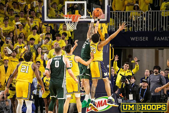 Morez Johnson Jr. (21), Aday Mara (15), and Yaxel Lendeborg (23)