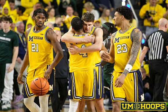 Morez Johnson Jr. (21), Nimari Burnett (4), Will Tschetter (42), and Yaxel Lendeborg (23)