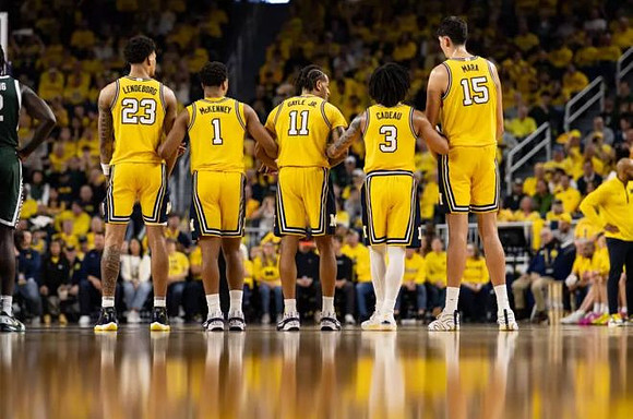 Yaxel Lendeborg (23), Trey McKenney (1), Roddy Gayle Jr. (11), Elliot Cadeau (3), and Aday Mara (15)