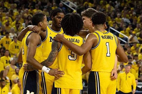 Nimari Burnett (4), Morez Johnson Jr. (21), Elliot Cadeau (3), Will Tschetter (42), and Trey McKenney (1)